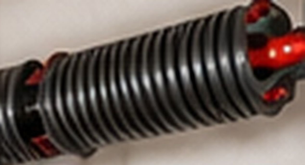 Garage door torsion spring close-up